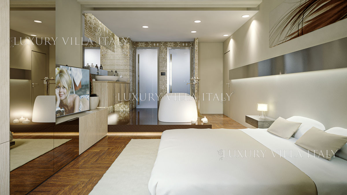 camera da letto arredata in stile classico moderno
